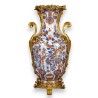 Vase \"Grues\" en porcelaine et bronze