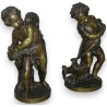 Paire de bronzes de putti
