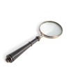 Magnifying glass with a blackened wooden handle