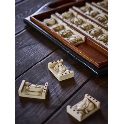 Renaissance-style domino set with board