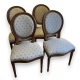 Suite de 4 chaises style Louis XVI à médaillon