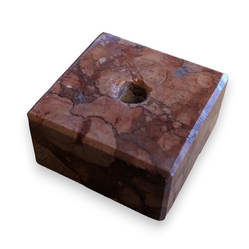 Square pink marble plinth