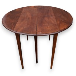 Mesa redonda de caoba con alas abatibles y 3 extensiones en  Moinat SA  - Antigüedades y decoración