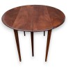 Mesa redonda de caoba con alas abatibles y 3 extensiones en  Moinat SA  - Antigüedades y decoración