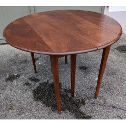 Mesa redonda de caoba con alas abatibles y 3 extensiones en  Moinat SA  - Antigüedades y decoración