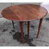 Mesa redonda de caoba con alas abatibles y 3 extensiones en  Moinat SA  - Antigüedades y decoración