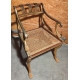 Fauteuil Regency aux pattes de lion, assise cannée