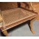 Fauteuil Regency aux pattes de lion, assise cannée