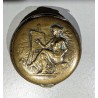 Round embossed brass box, ‘Painter’