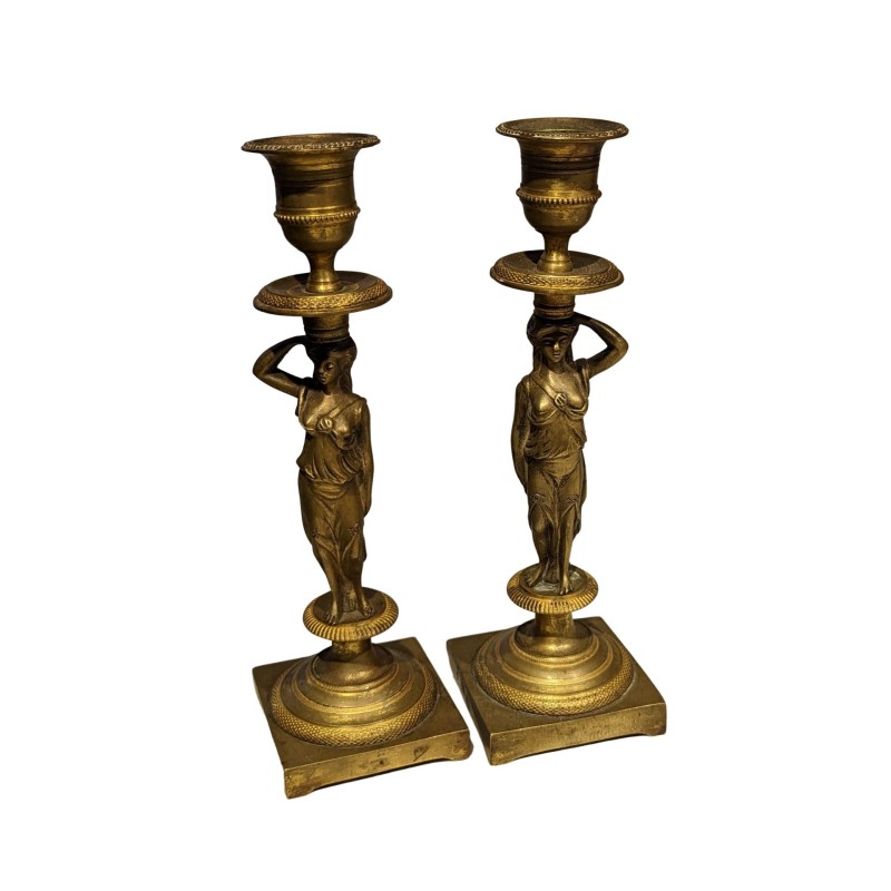 Pair of bronze Caryatid candlesticks
