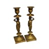 Pair of bronze Caryatid candlesticks