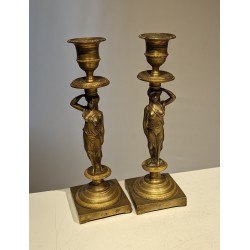 Pair of bronze Caryatid candlesticks