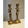 Pair of bronze Caryatid candlesticks
