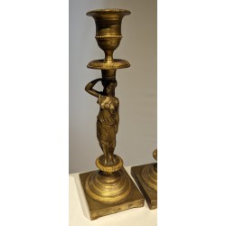 Pair of bronze Caryatid candlesticks