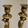 Pair of bronze Caryatid candlesticks