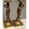 Pair of bronze Caryatid candlesticks