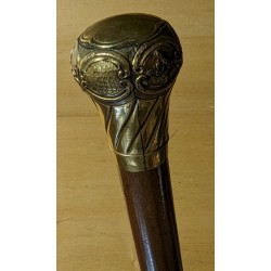 Canne pommeau en laiton repoussé