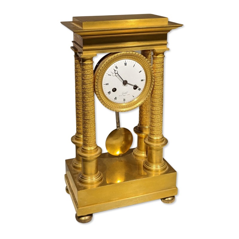 Empire-style cantilever clock by Griébel