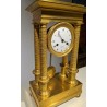 Empire-style cantilever clock by Griébel
