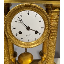 Empire-style cantilever clock by Griébel