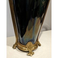 Iridescent porcelain vase with brass fittings