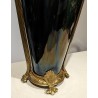 Iridescent porcelain vase with brass fittings