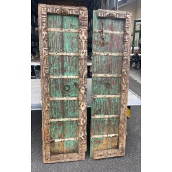 A pair of Indian doors painted blue