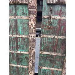 A pair of Indian doors painted blue