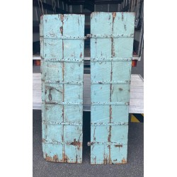 A pair of Indian doors painted blue