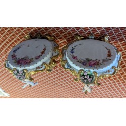 A pair of Capo di Monte porcelain side tables