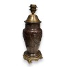 Bronze lamp with a relief design of birds