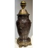 Bronze lamp with a relief design of birds