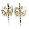 A pair of Louis XVI wall sconces in gilded bronze and blue