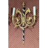 A pair of Louis XVI wall sconces in gilded bronze and blue