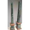 A pair of obelisks in green and pink marble