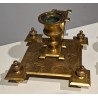 Paire de bougeoirs base carrée en bronze doré