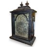 Baroque clock in black wood
