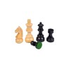 Chess pieces made from dark and light palm wood