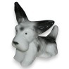 Sculpture Chien couché \"Fox Terrier\", en porcelain