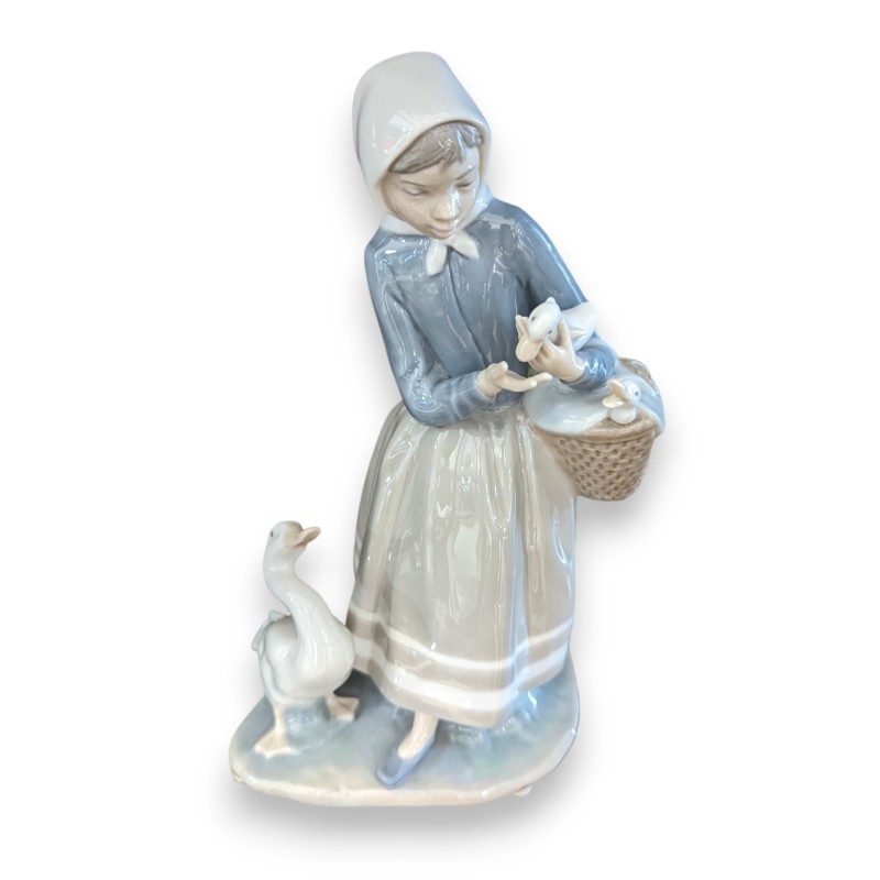 Lladro porcelain farmer and geese