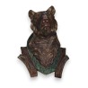 Tête d'ours en bois sculpté peint