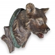 Tête d'ours en bois sculpté peint