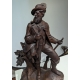 Chasseur en bois sculpté