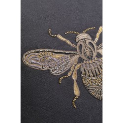 Black bee-embroidered cushion