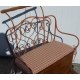 Pair of wrought iron chairs with brass balls