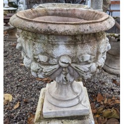 Pair of low garland-decorated basins