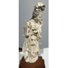Okimono "Femme à la fleur"