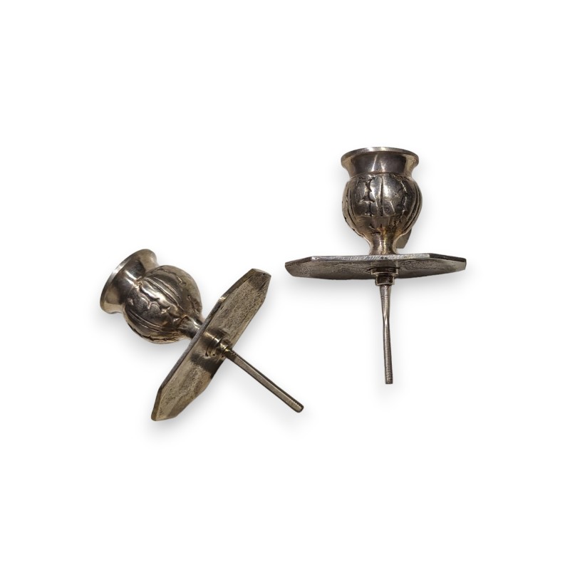 A pair of silver-plated bronze candlesticks by Tric-Trac