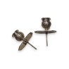 A pair of silver-plated bronze candlesticks by Tric-Trac
