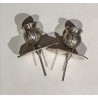 A pair of silver-plated bronze candlesticks by Tric-Trac